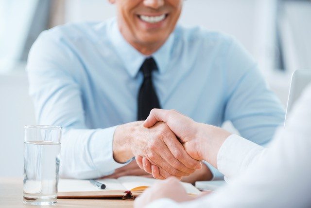 shaking hands interview